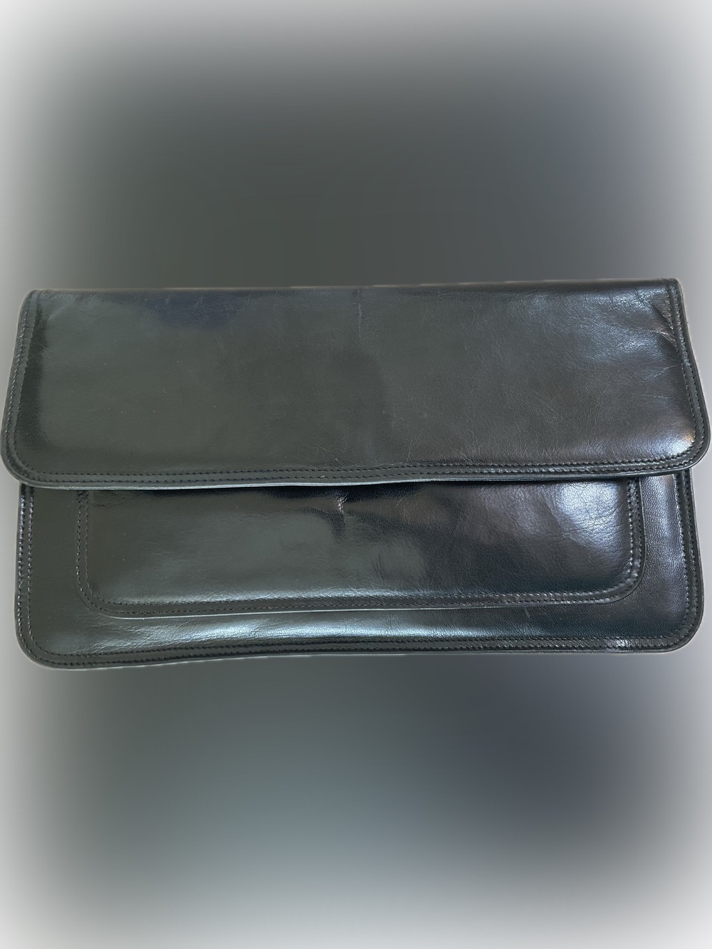 Vintage black leather clutch